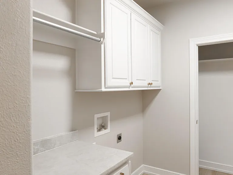 Laundry Room w/ Storage Closet