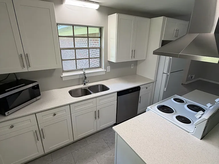 View of kitchen amenities & cooking area