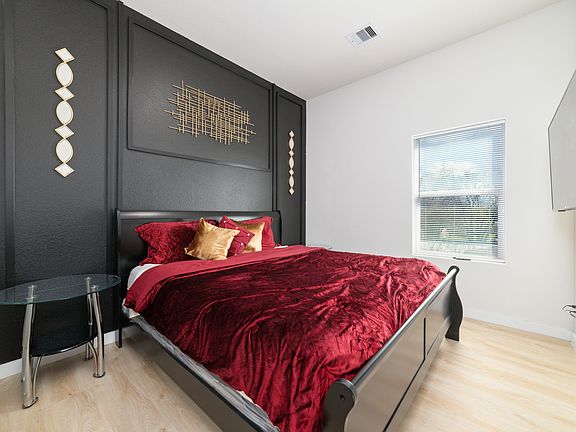 Guest bedroom with King size bed can sleep up to 3 comfortably, 55 inch smart TV.