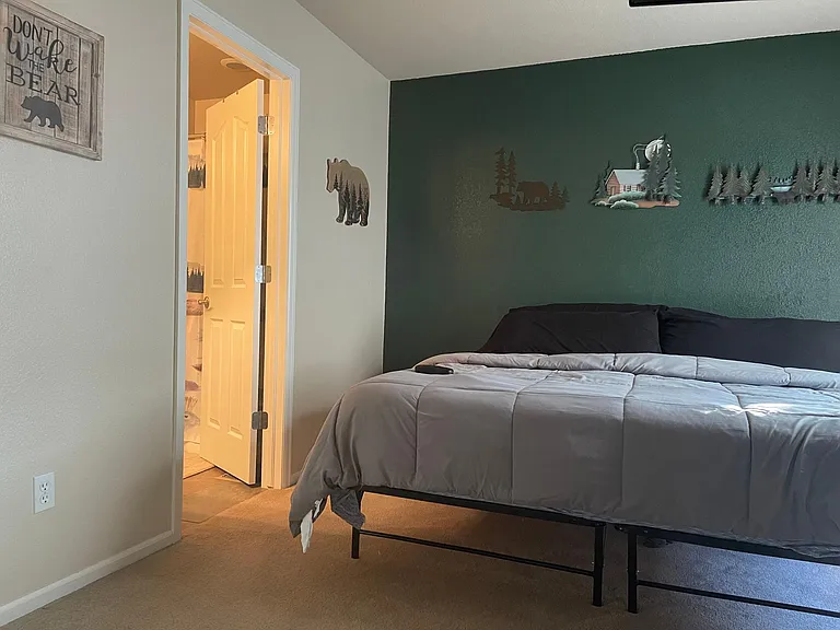 Primary bedroom with large, private full bathroom
