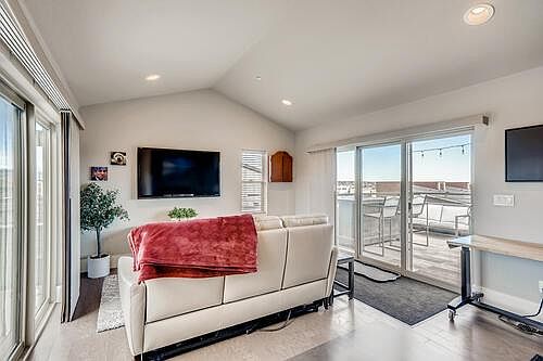 4th floor space between 2 decks- can be used for multiple purposes - ours is currently a workout room but has been an office and a 2nd living area and considered for a 3rd bedroom too.