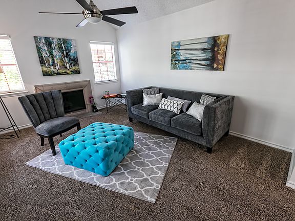 Living Room with Fireplace * select units
