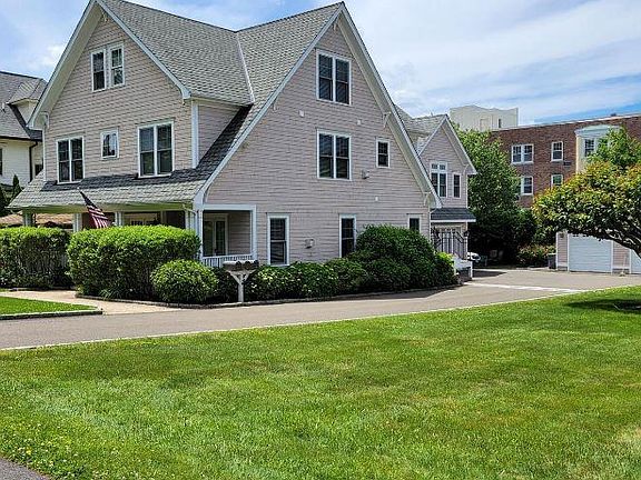 Front Entrance and Views of Beautifully Landscaped Yard
