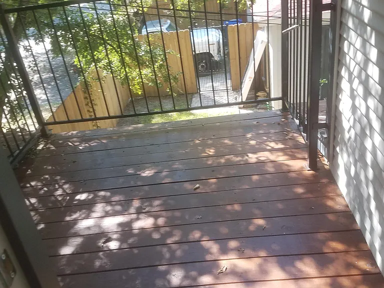 Deck off back door out bedroom window. Washer Dryer accessed from deck.