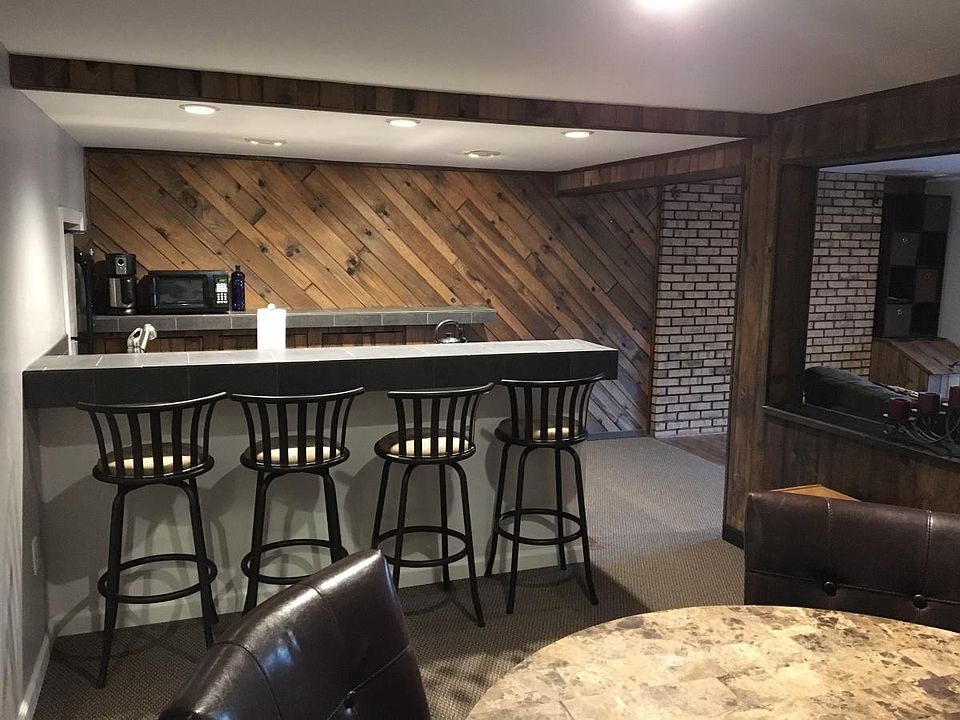 newly renovated kitchen and bar! Stainless steel appliances