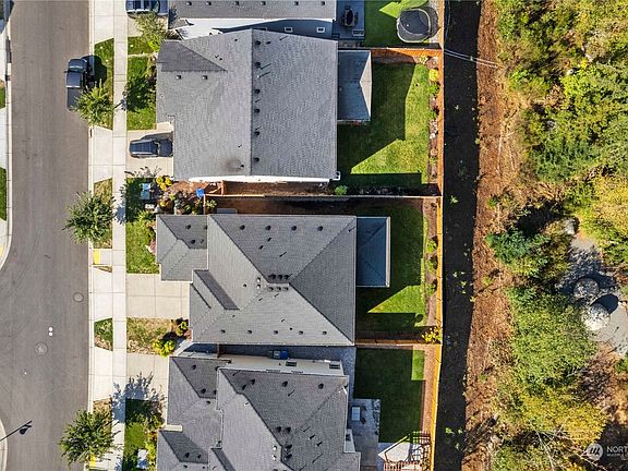 Home backs to a buffered area with walking trails.>