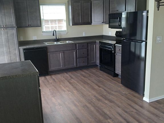 All new cabinets, plumbing, electric oven/range, microwave, dishwasher and refrigerator