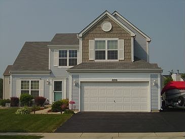 Front w/extended driveway