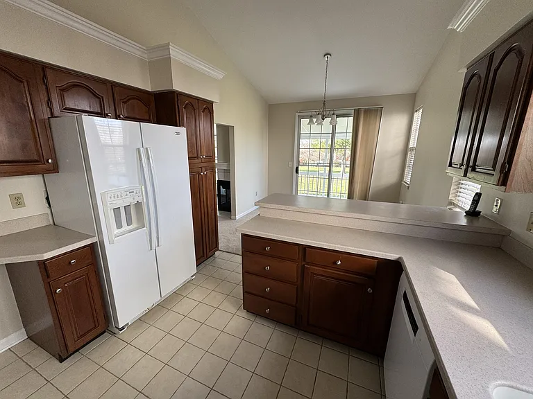 Kitchen Refrigerator and dining area