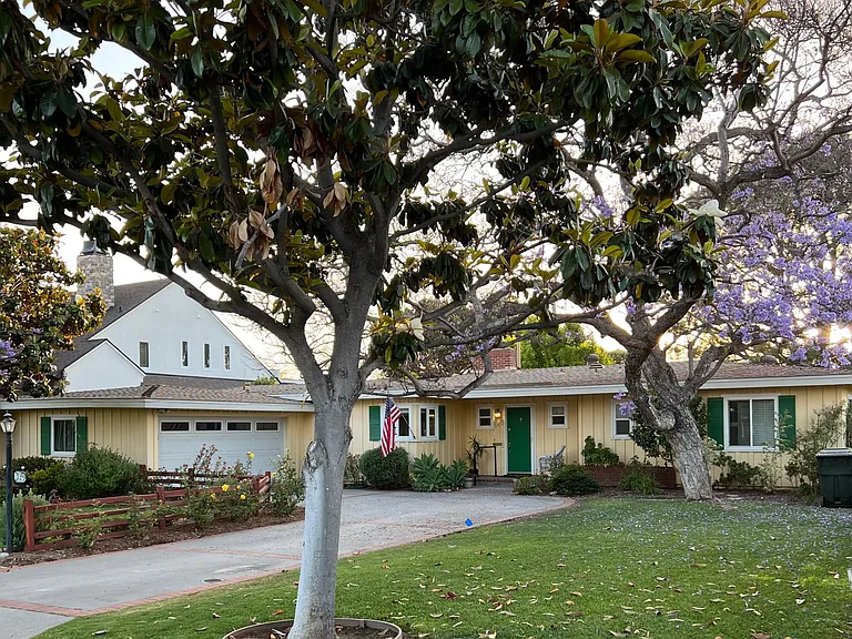 Frontal view of home with garage and driveway