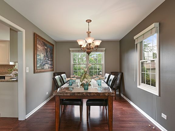 Spacious Seating Area Overlooking the Lush Backyard