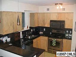 Recently updated kitchen with granite counters, tile backsplash, etc.