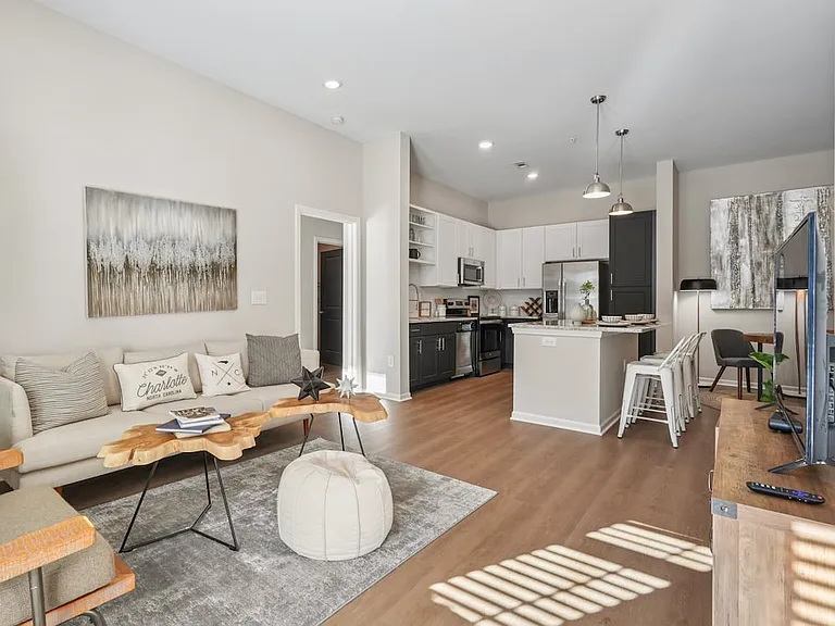 Kitchen and living room with hard surface flooring