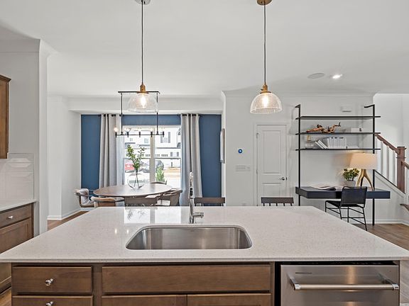Open Kitchen with Island and Dining Area