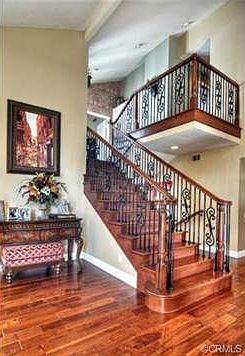 Gorgeous stairway and hardwood flooring