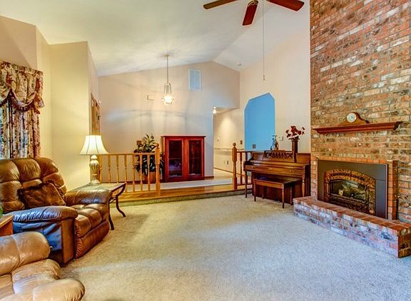 Another look at the Stunning Brick Fireplace in the Living Room!