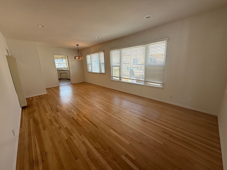 Open Living and Dining Room with Hardwood Floors