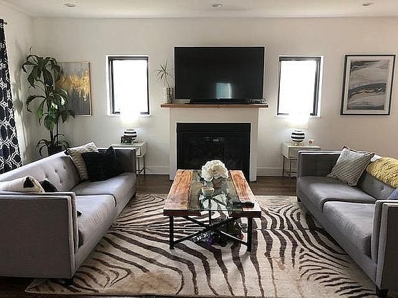 Large open floor concept. Living room with gas fireplace