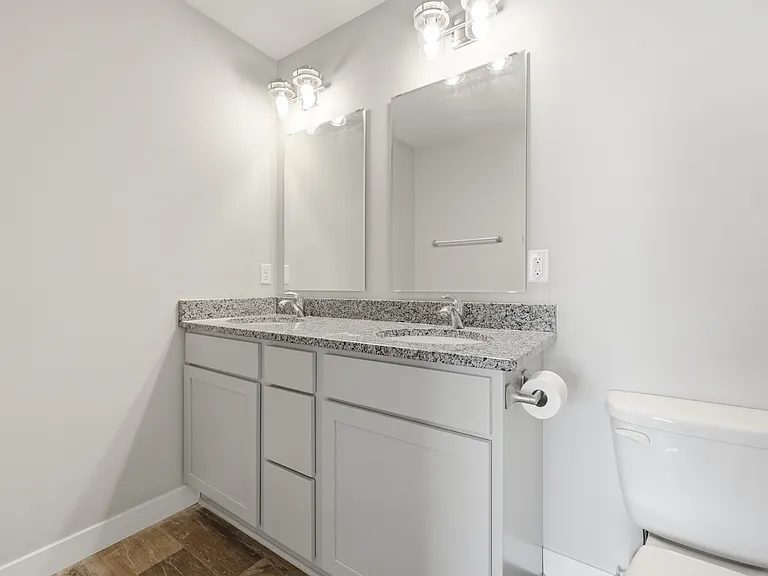 Master bath with double granite vanity.