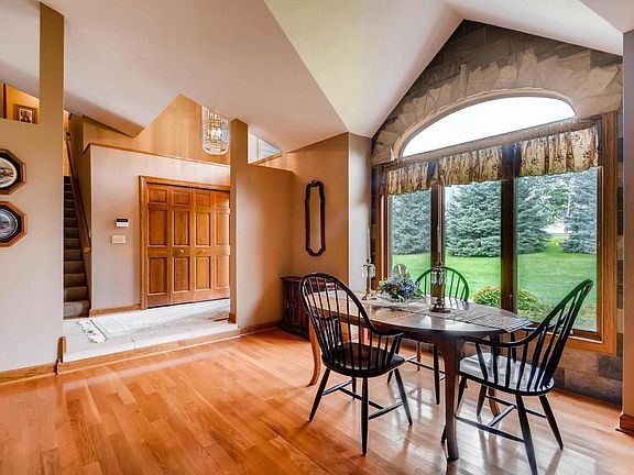 Updated kitchen with vaulted ceilings, tile flooring, new stainless steel appliances and Granite countertops.