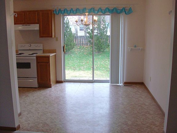 Dining room with glass doors to the backyard