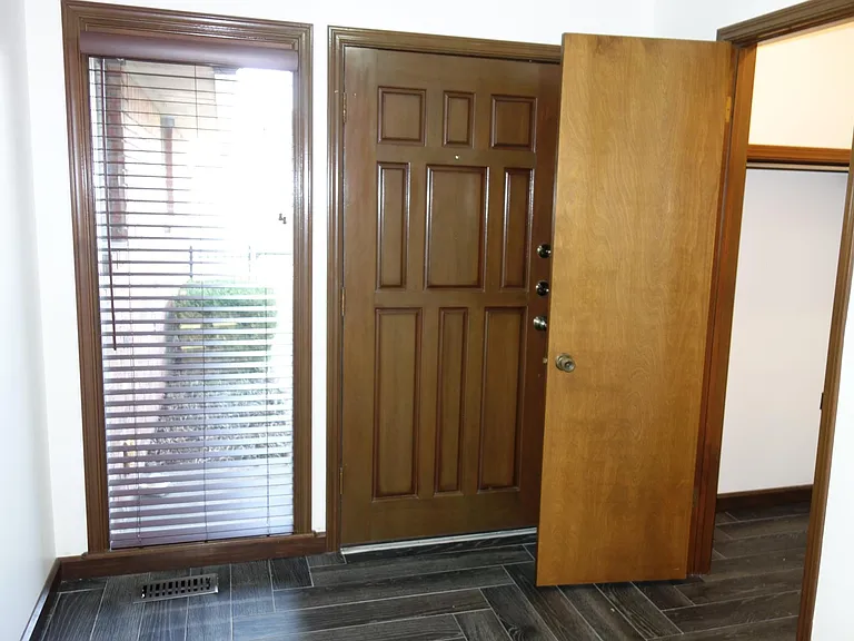 View of coat closet door opened