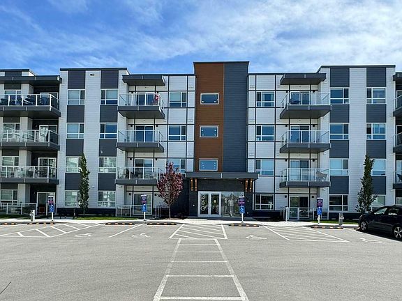 3rd image of 102-360 Harvest Hills Way NE #102