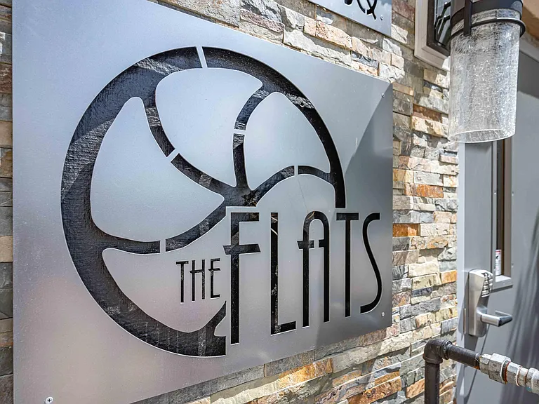 The Flats are located at 204 Adamson Square.