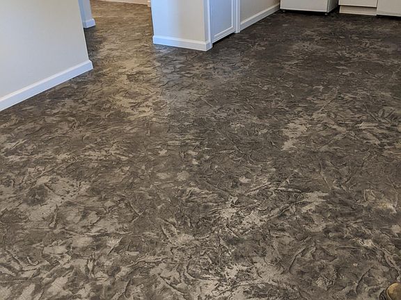 Custom pressed and stained concrete floors