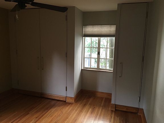 Generous closets outfitted with closet system