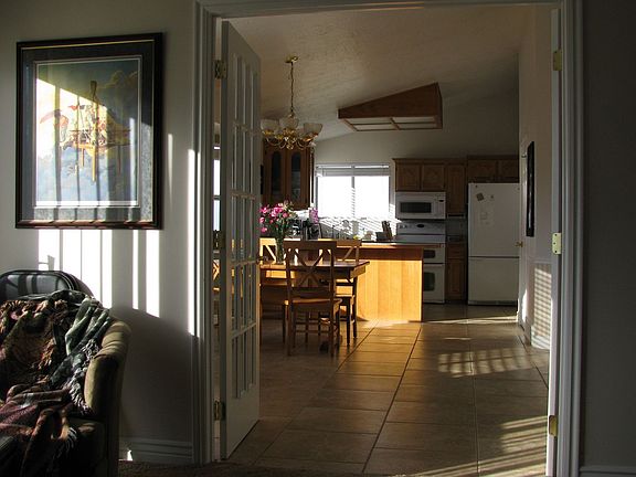 The kitchen and dining rooms as seen from the family room