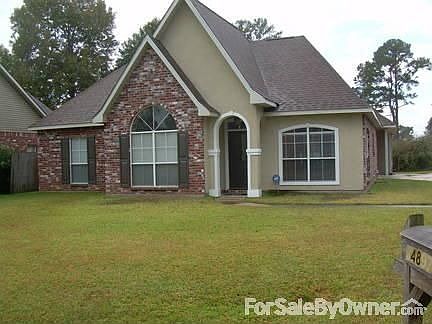 Completely Updated home : Brick, stucco, vinyl siding. Two car carport, rear storage. Insulated wind