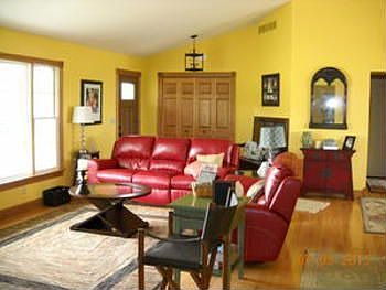 As you start your tour through this gorgeous home  check out the spacious living room that offers plenty of natural lighting.