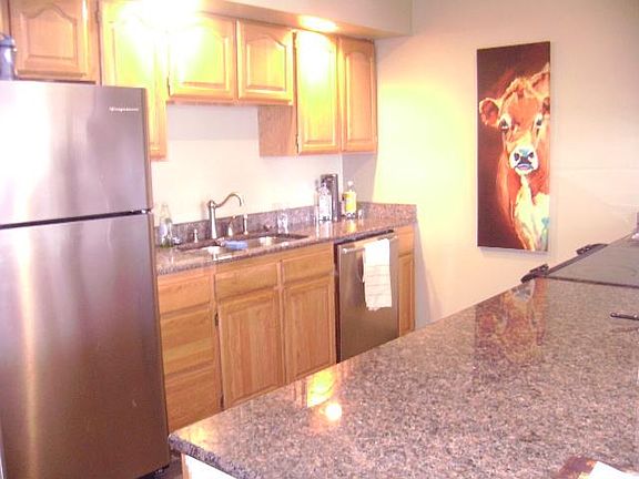 Kitchen with granite counters / stainless appliances
