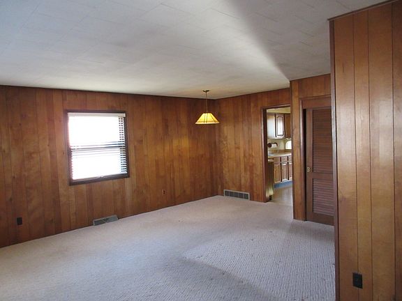 The first floor family room is right off the kitchen and has an area for a dining table so there is 