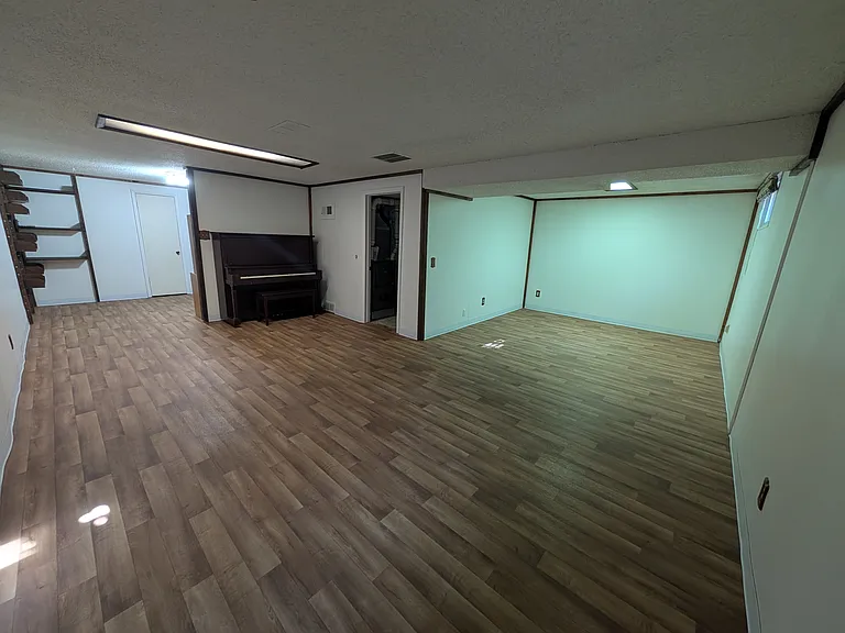 spacious area in basement by laundry room