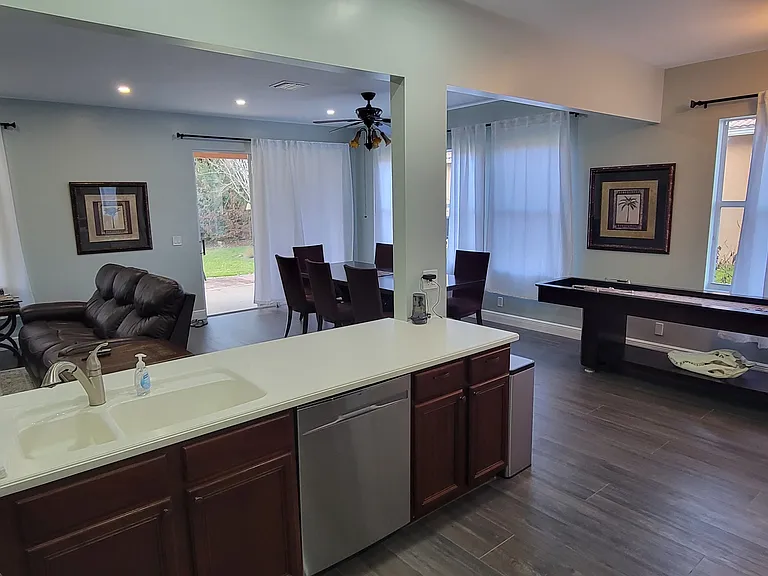 Renovated open floor plan kitchen, dining room, main living room.