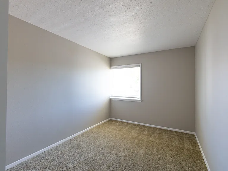 Third Bedroom in the Three Bedroom Townhome at Woodbridge Bloomington