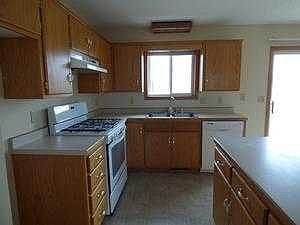 Kitchen, new flooring, stove and dishwasher