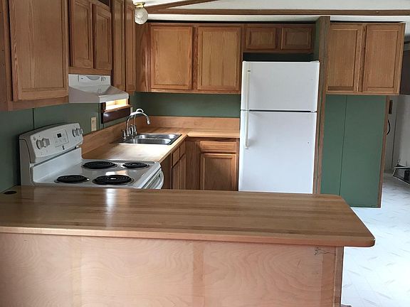 Updated kitchen cabinetry with lots of storage