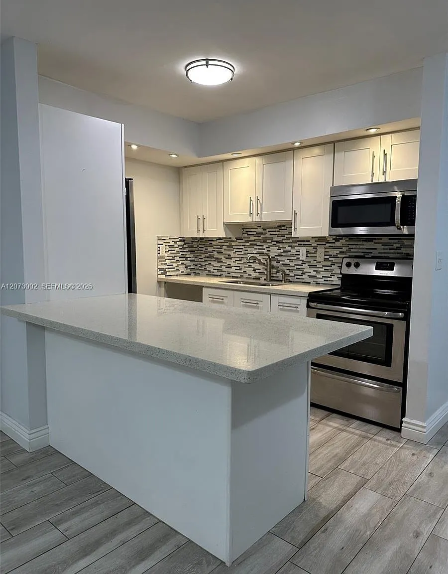 Countryside Village Condo — Photo 1