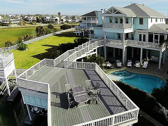 Large deck over the boat house. Composite material decking and handrails on all decks and cat walk f