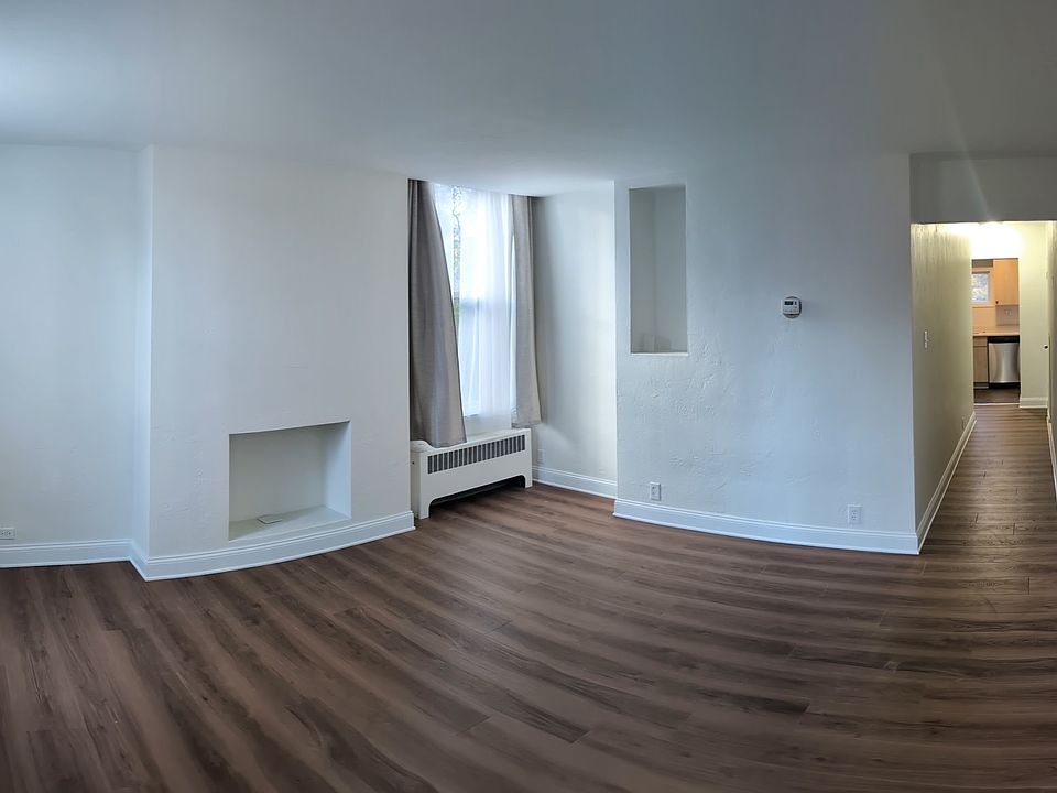 Living room view down hall to kitchen