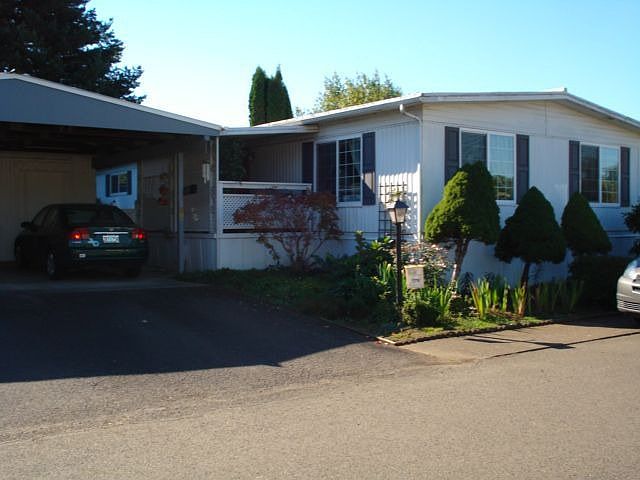 Front view with covered deck