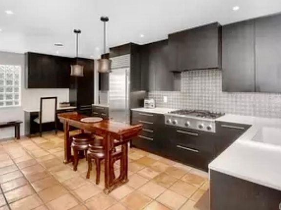 Chefs kitchen w/ custom cabinetry