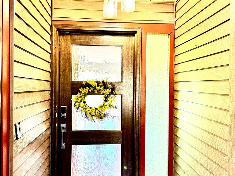 Front entrance. New door. Smart locks.