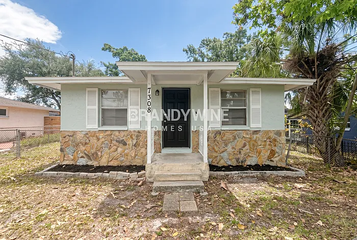 7308 S Kissimmee St — Photo 2