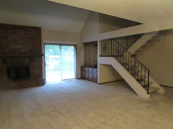 Built-in Bookcase and Stairs to Second Floor