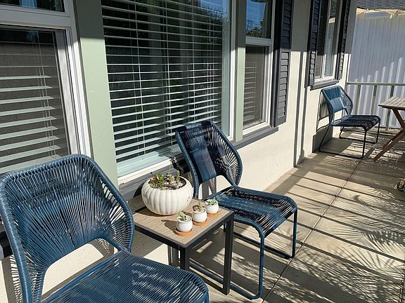 Front porch perfect for a cup of coffee in the morning
