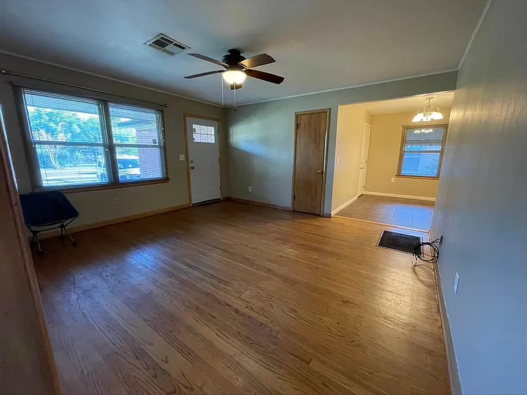 Living room from hallway looking back at entrance